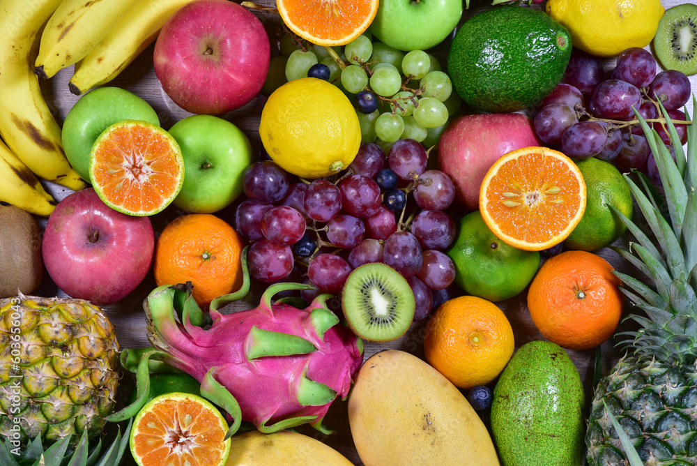 assorted fruits, top view healthy food concept Including high vitamin fruits, fresh fruits, thai fruits assorted fruits, top view healthy food concept Including high vitamin fruits, fresh fruits, thai fruits