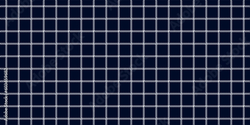 Windowpane plaid blue and white seamless pattern with narrow lines. Classic wool suit fabric. Elegant masculine design. Simple monochrome background. Twill variegated woolen material