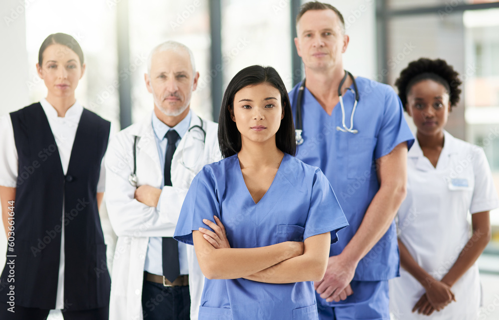 Healthcare, team and portrait of doctors with nurses in hospital with arms crossed for leadership or support. Diversity, mindset and proud face of medical group in solidarity or service collaboration