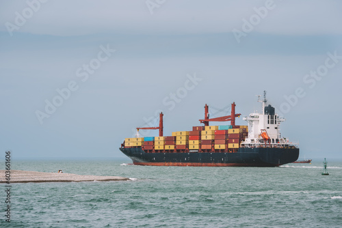 A ship loaded with containers at sea