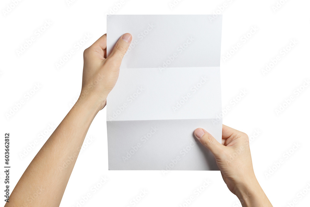 Hands holding a folded sheet of white paper, cut out Hands holding a folded sheet of white paper, cut out