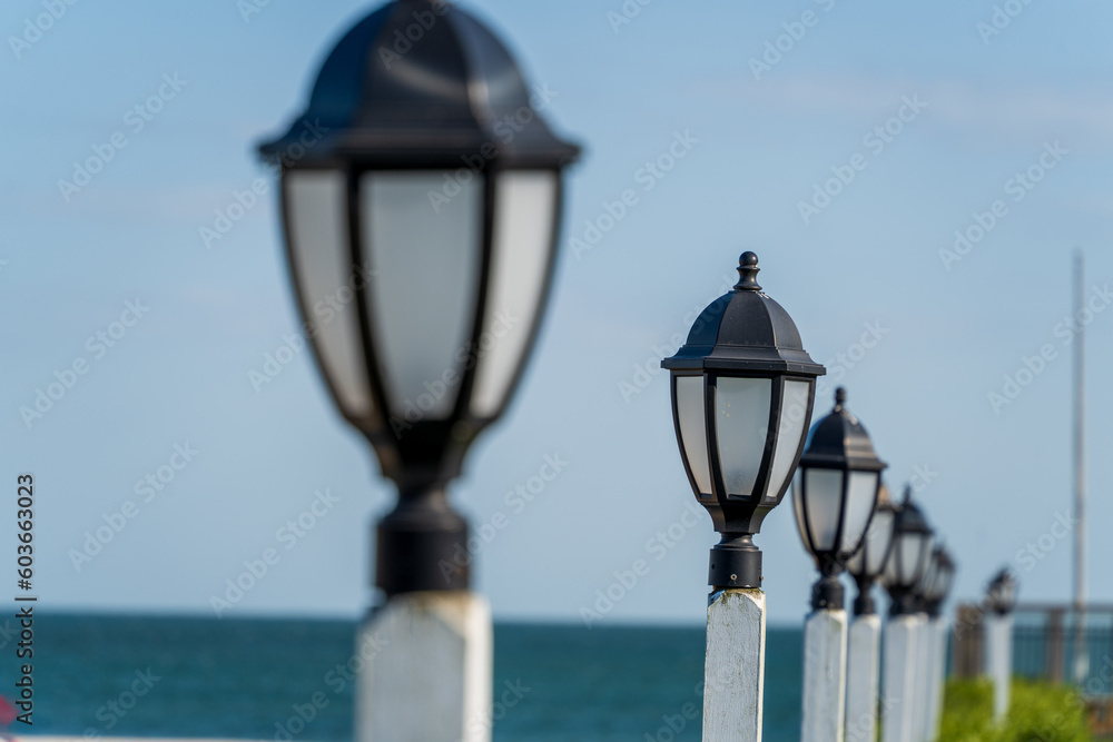 Lamp posts by the ocean 