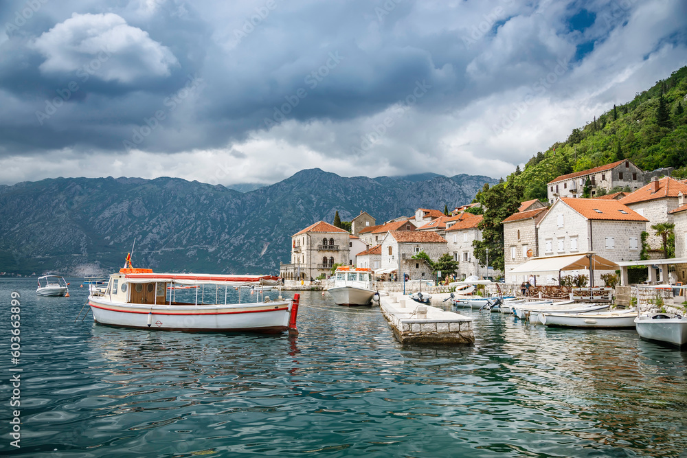 Small harbor with boats in the historic town of Perast in Bay of Kotor