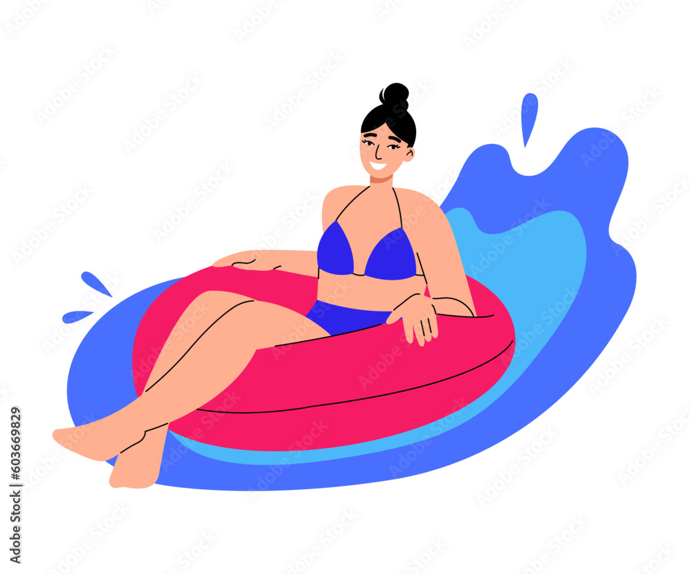 Woman swimming on inflatable rubber ring. Summer vacation, leisure on water, beach activity concept.