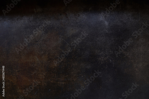 Dark brown surface made of artificial leather with scratches. Background with scratch surface texture. Grunge background. Overlay for your design with copy space. High quality photo