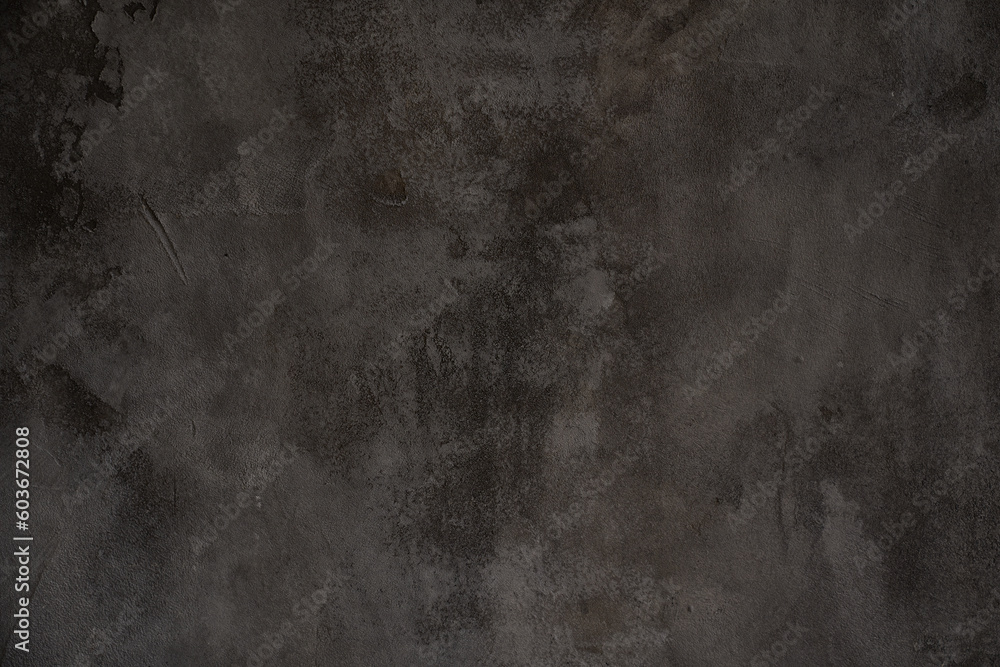 Fototapeta premium The stone surface is dark in color. The texture of old flagstone in the grunge style. Overlay for your design with copy space. High quality photo