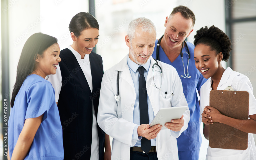 Digital tablet, team and group of healthcare workers in discussion on xrays in medicare clinic. Collaboration, diversity and professional medical employees analyzing a diagnosis on mobile in hospital Digital tablet, team and group of healthcare workers in discussion on xrays in medicare clinic. Collaboration, diversity and professional medical employees analyzing a diagnosis on mobile in hospital