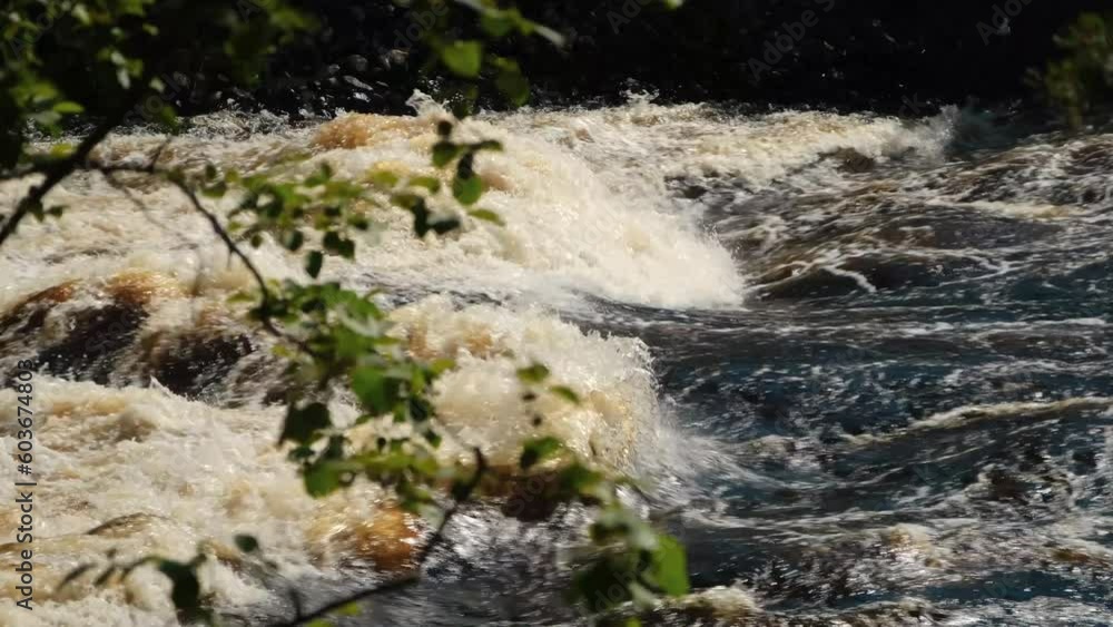 Stormy mountain river with a yellow tint in the Republic of Karelia in summer. The nature of Russia. 4k horizontal slow motion footage. Stormy mountain river with a yellow tint in the Republic of Karelia in summer. The nature of Russia. 4k horizontal slow motion footage.