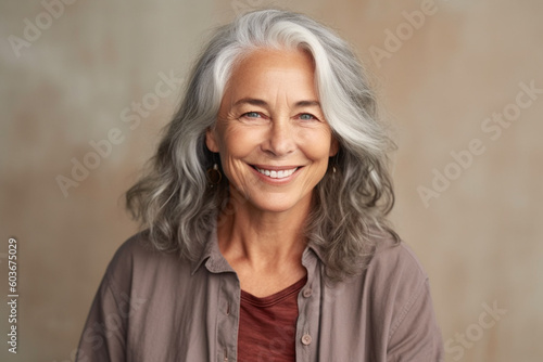 Portrait of a stylish smiling old woman with gray hair on a brown background, created with Generative AI Technology