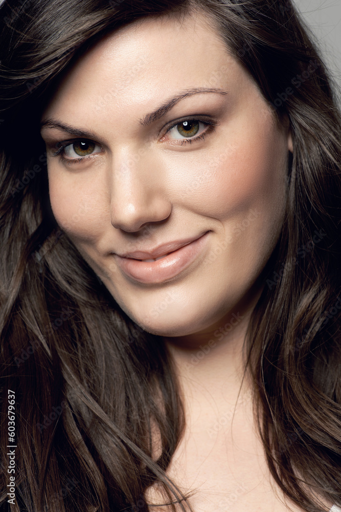 Woman, natural beauty and portrait with skincare and dermatology from Spain. Isolated, face closeup and young female person in studio with smile from skin glow treatment with cosmetics and makeup Woman, natural beauty and portrait with skincare and dermatology from Spain. Isolated, face closeup and young female person in studio with smile from skin glow treatment with cosmetics and makeup