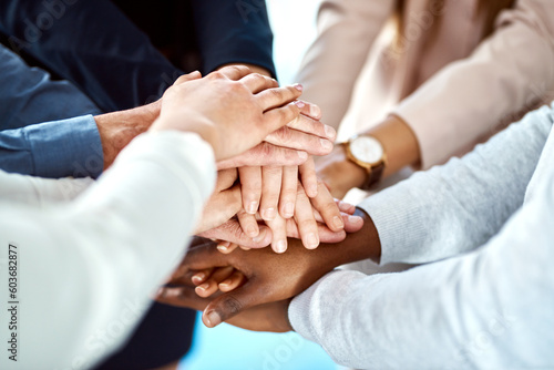 Team building, support or hands of business people in huddle for, partnership, support or community mission. Trust, motivation or closeup of corporate group of workers with goals or target in meeting
