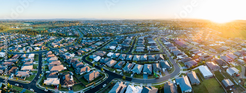 Panoramic view of sunset over houses in residential suburb