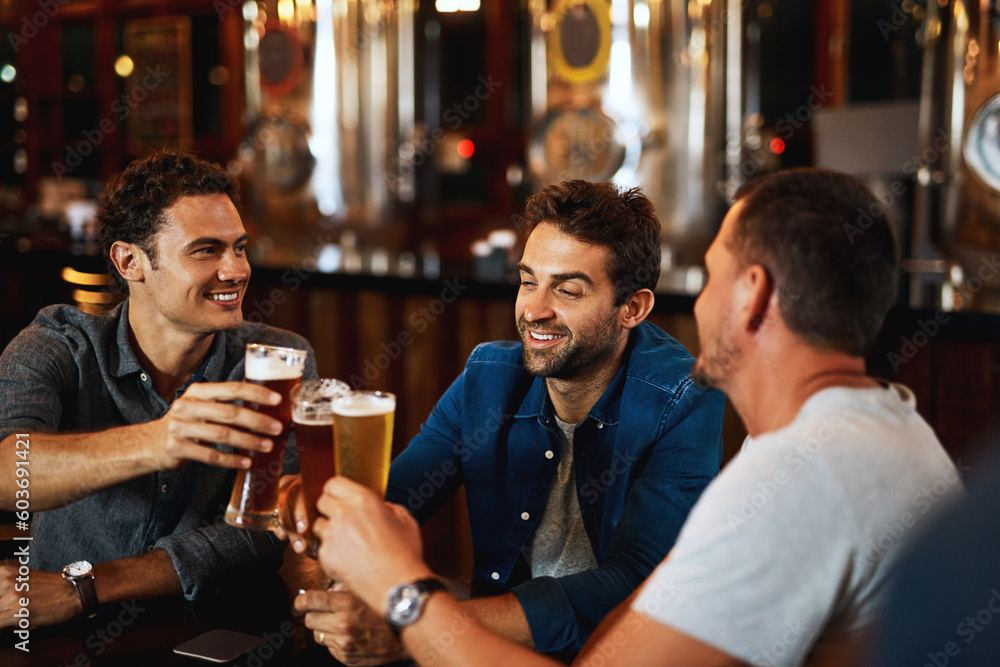Beer, cheers and men drinking with friends at social event in a restaurant with happiness. Alcohol, glasses and toast at a pub at happy hour with smile and conversation with drinks and celebration