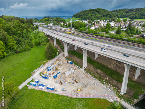 aerial view of a modern highwaybridge with construction site 