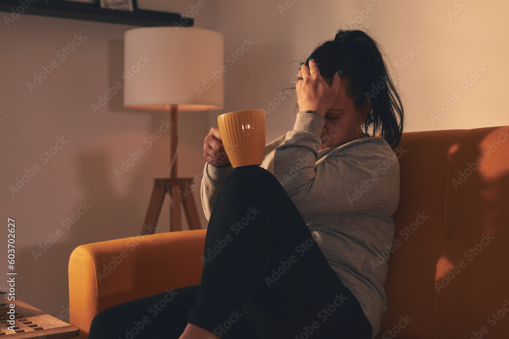 Woman with stomach and head pain at home. Woman with stomach and head pain at home.
