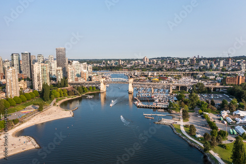 Aerial view of area around False Creek with Granville Street Bridge, Burrard Street Bridge and False Creek Harbour in Vancouver, Canada with boats on water photo