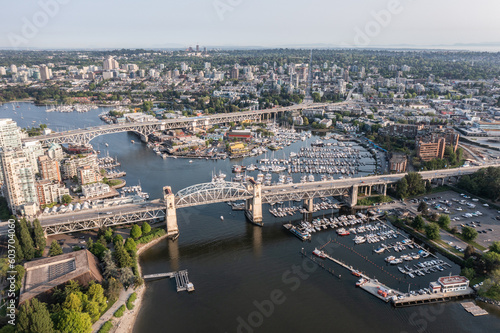 Aerial view of area around False Creek with Granville Street Bridge, Burrard Street Bridge and False Creek Harbour in Vancouver, Canada with boats on water