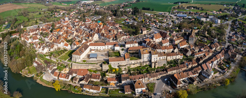 Aerial view of the old town of Pesmes in France on a sunny afternoon in spring.