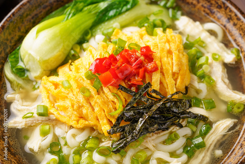 Special Chinese food chicken noodle soup on dark background