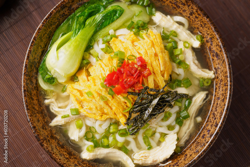 Special Chinese food chicken noodle soup on dark background