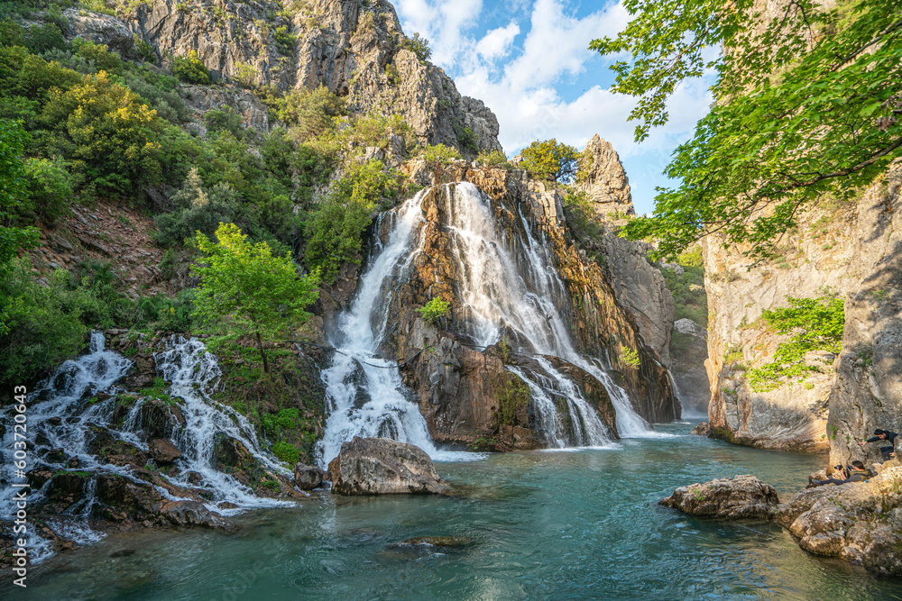 impressive view of Cündüre waterfall, which  is one of the biggest one around in Antalya and it springs out from many cracks and rifts on the face of the mountainous terrain, falling about 40 meters.