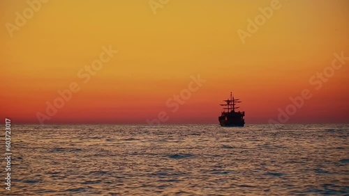 Pirate Ship Sunset The fleet is an old wooden warship in a foggy ocean at sunset. High quality FullHD footage