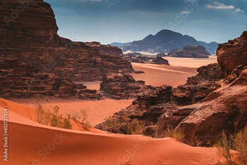 Fototapeta Naklejka Na Ścianę i Meble -  Amazing and spectacular landscapes of Wadi Rum desert in Jordan. Dunes, rocks, it's all here. Beautiful weather gives the climate to this place.
