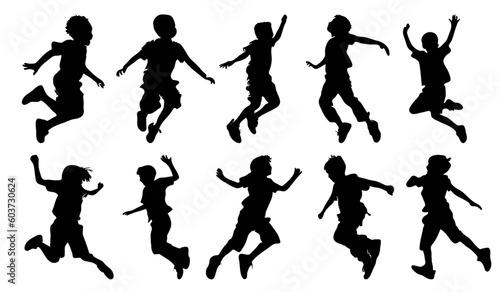 set of silhouettes of boys jumping high happily