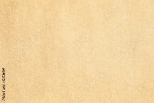 Brown kraft paper background with grainy texture