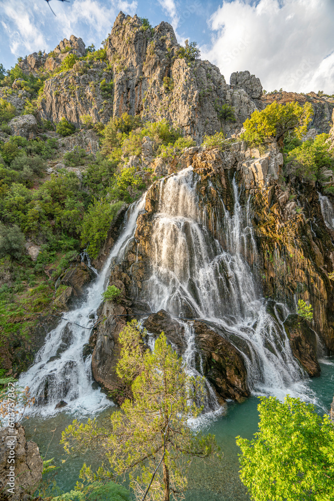 Obraz premium impressive view of Cündüre waterfall, which is one of the biggest one around in Antalya and it springs out from many cracks and rifts on the face of the mountainous terrain, falling about 40 meters.