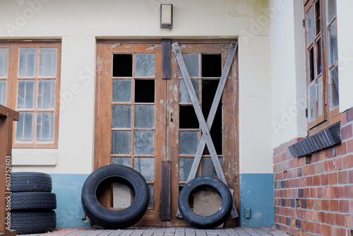 Old Hartenbos house with broken windows photo