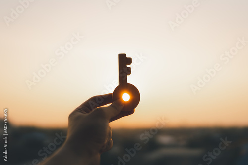 Tableau sur toile Businessman holding key model