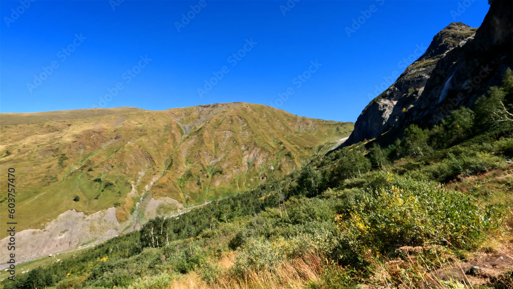 mountainscape, picture of Arkhyz mountains at fall with blue sky - photo of nature mountainscape, picture of Arkhyz mountains at fall with blue sky - photo of nature
