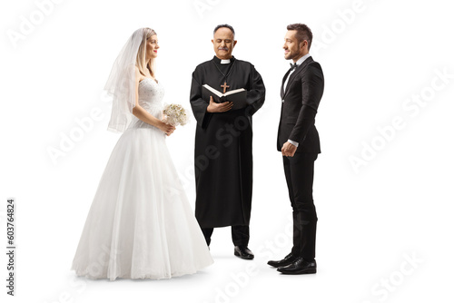 Officiating priest declaring bride and groom as a wedded couple