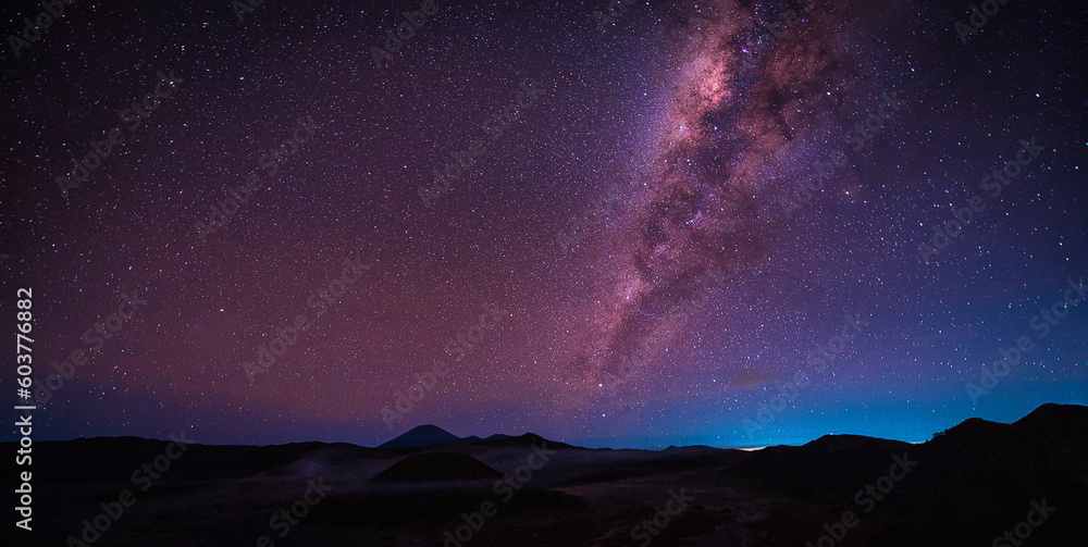 Landscape with Milky way galaxy over Mount Bromo volcano (Gunung Bromo) in Bromo Tengger Semeru National Park, East Java, Indonesia. Night sky with stars. Long exposure photograph. Landscape with Milky way galaxy over Mount Bromo volcano (Gunung Bromo) in Bromo Tengger Semeru National Park, East Java, Indonesia. Night sky with stars. Long exposure photograph.