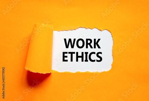 Work ethics symbol. Concept words Work ethics on beautiful white paper. Beautiful orange table orange background. Business and Work ethics concept. Copy space.