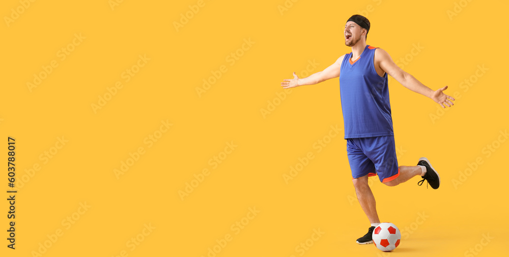 Emotional soccer player with ball on yellow background with space for text