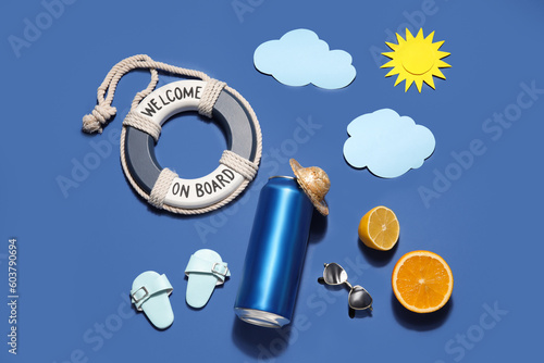 Wallpaper Mural Can of soda with beach decor and citrus fruits on blue background Torontodigital.ca