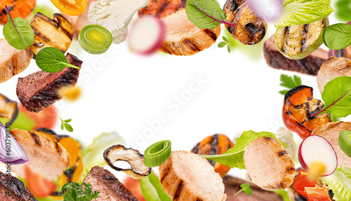Warm salad, grilled meet slices and chopped barbecue vegetables with herbs and salad leaves isolated, frame of bbq beef, chicken, carrot, zucchini and onion