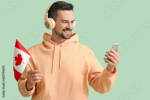 Handsome man in headphones ...