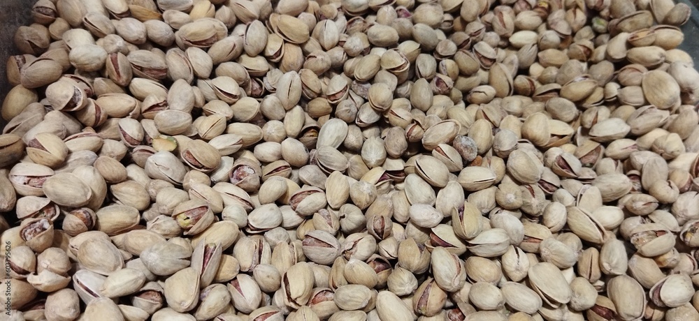 Lot of delicious pistachios are in the box Lot of delicious pistachios are in the box