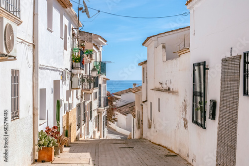 Fototapeta Naklejka Na Ścianę i Meble -  Altea old town with narrow streets and whitewashed houses. Architecture in small picturesque village of Altea near Mediterranean sea in Alicante province, Valencian Community, Spain