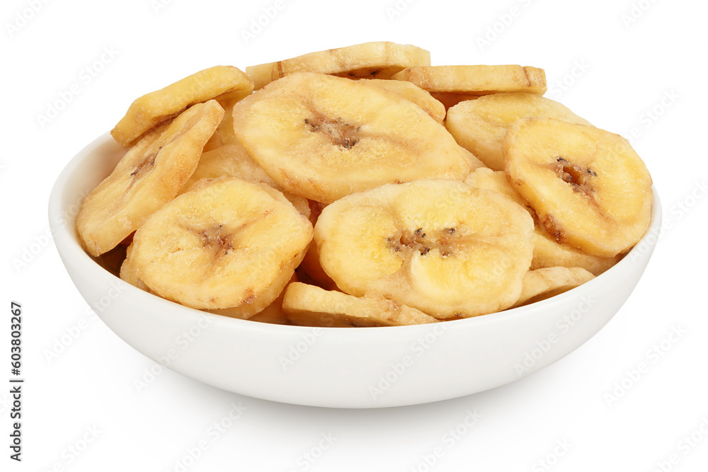 Dried banana chips in ceramic bowl isolated on white background with full depth of field