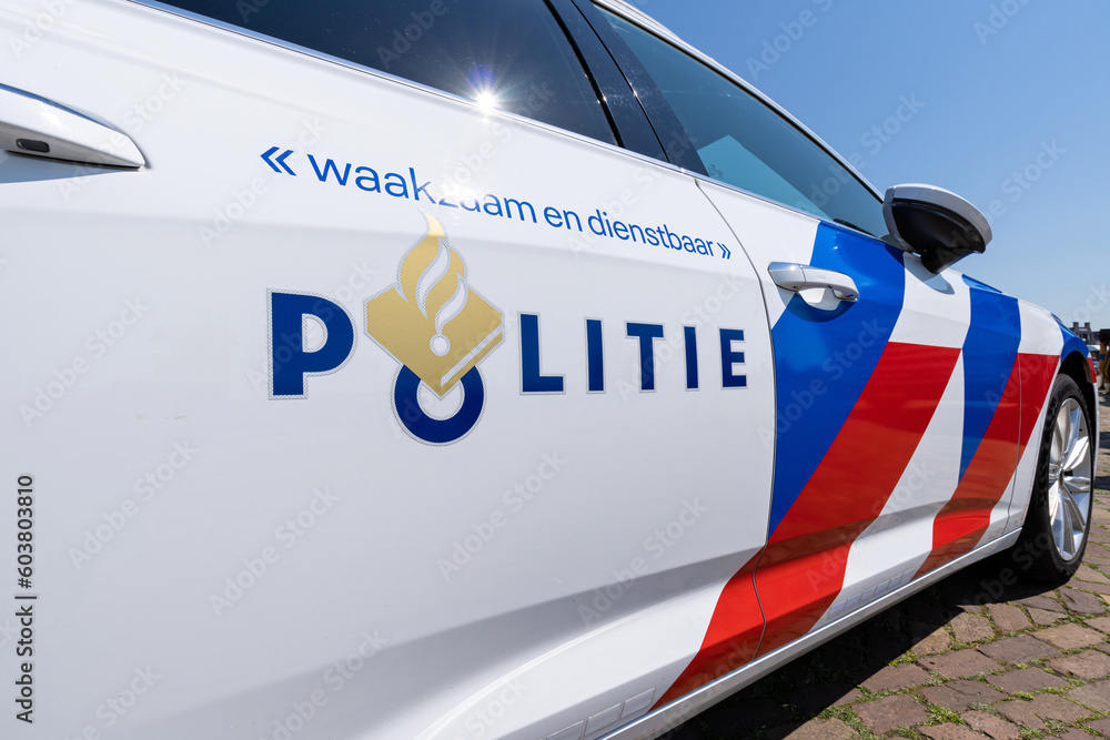 HARLINGEN, NETHERLANDS MAY 13, 2023 side of a Dutch Police car Stock Photo Adobe Stock