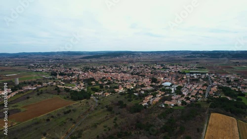 Aerial view around the old town of the city Paulhan in France on a sunny day in early spring photo