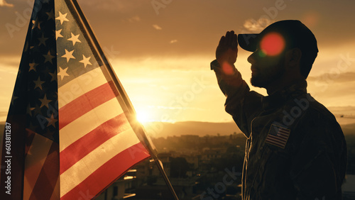 Cuadro en lienzo Silhouette of Military Salute of soldier for memorial day against flag at sunset