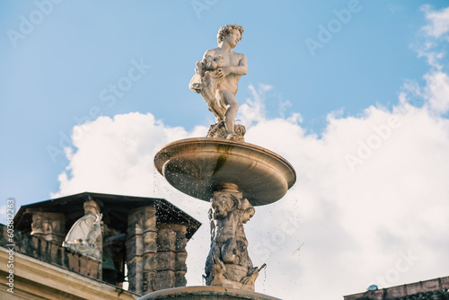 Naked boy as a fountain figure in Palermo