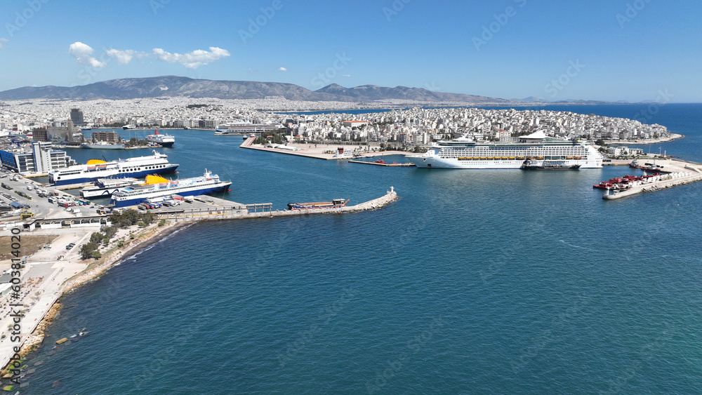 Aerial drone photo from busy port of Piraeus where passenger ships travel to Aegean destination islands, Attica, Greece