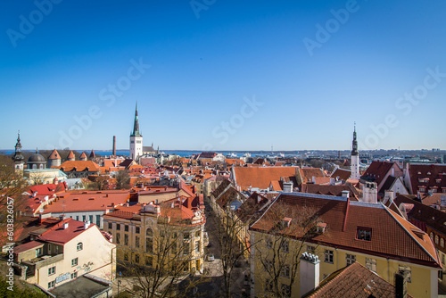 Late afternoon sunset view overlooking the medieval walled city of Tallinn Estonia on an early autumn spring day in the Baltics region of Northern Europe.