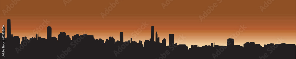 Silhouettes of a city skyline